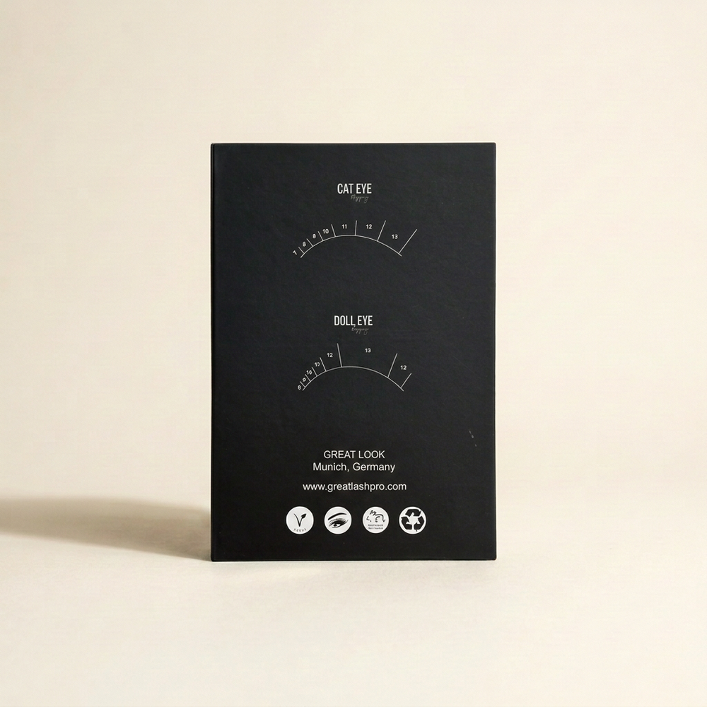 Back of Great Lash Pro lash box with white lash diagrams on a light beige background and soft leftward shadow